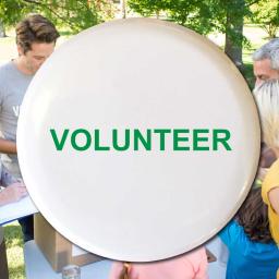 volunteer-50mm-white-green-text-button-badge.jpg