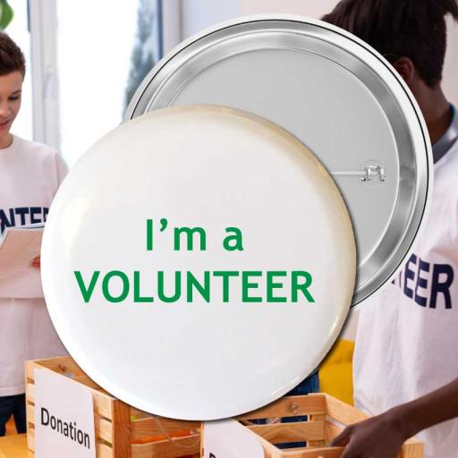 im-a-volunteer-white-green-text-button-badge.jpg